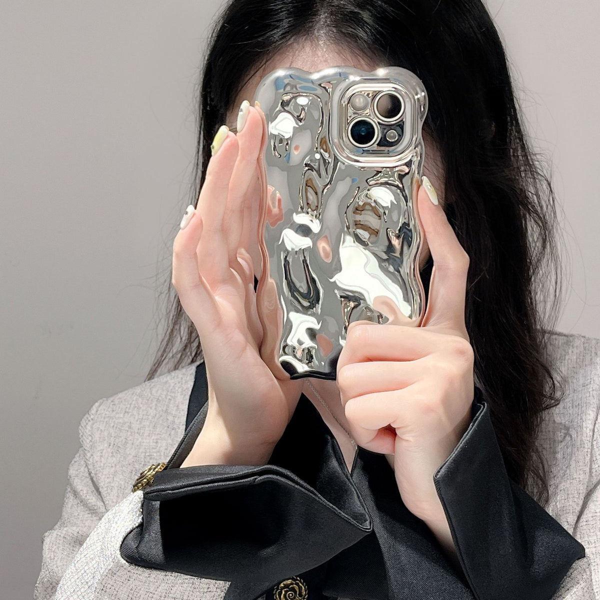 Soft-touch bubble textured iPhone case lifestyle view
